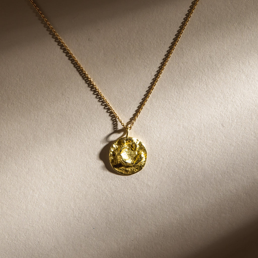 Small texutred, organic moon pendant necklace in 18ct yellow gold