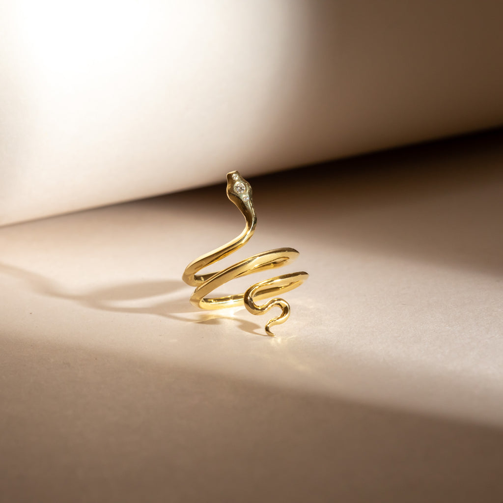 Yellow gold and diamond snake ring 