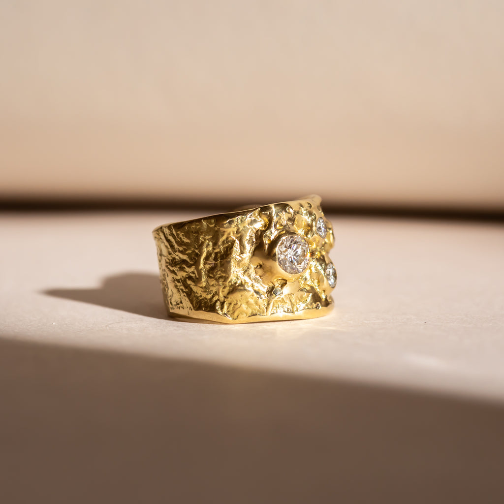 Sculptural solid gold diamond ring 