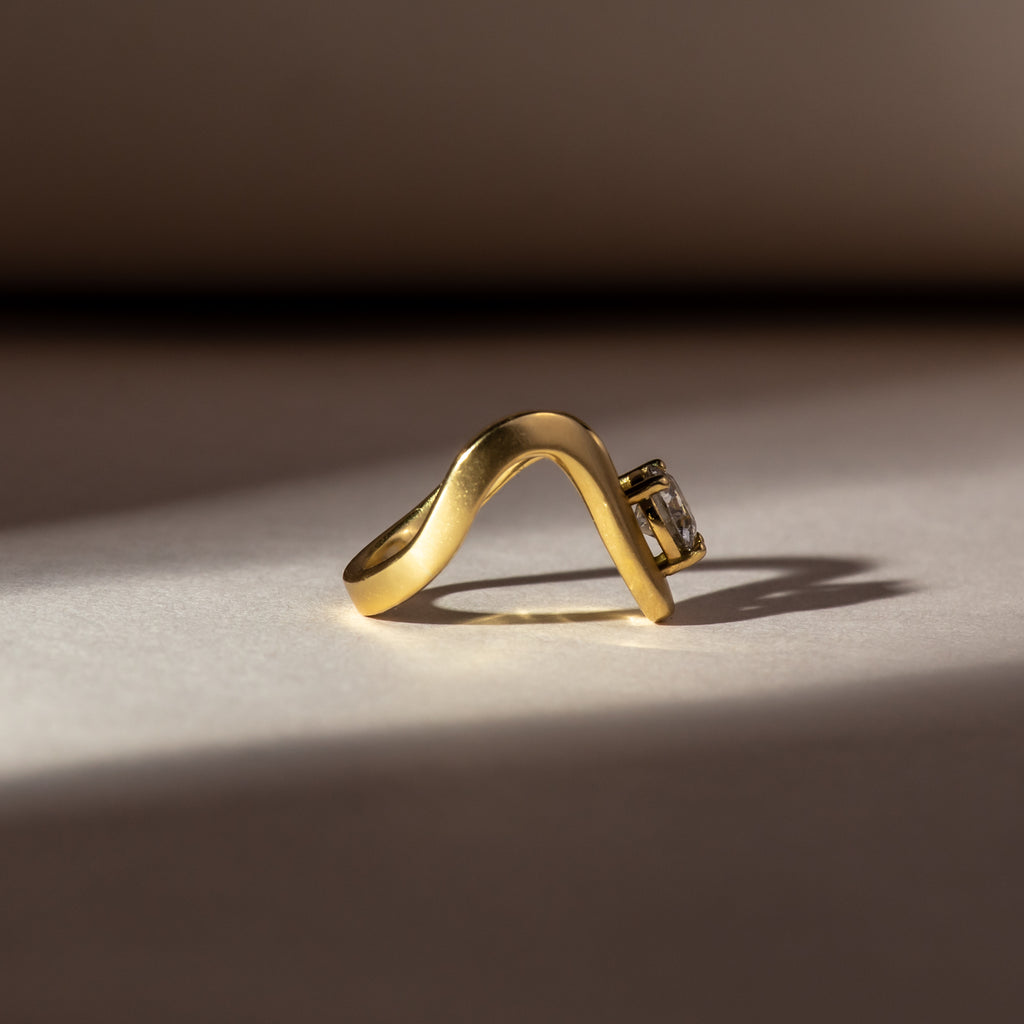 Diamond wave ring in yellow gold