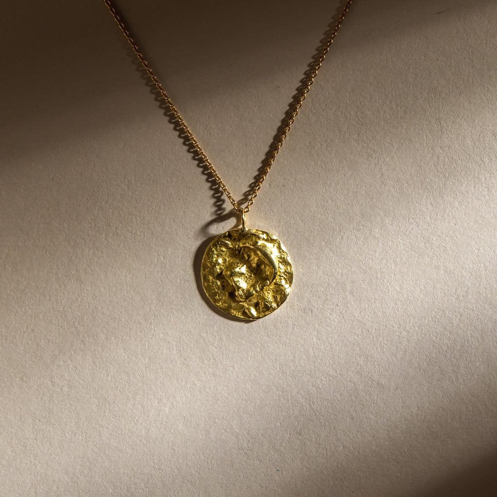 18ct gold moon disc pendant necklace with textured surface
