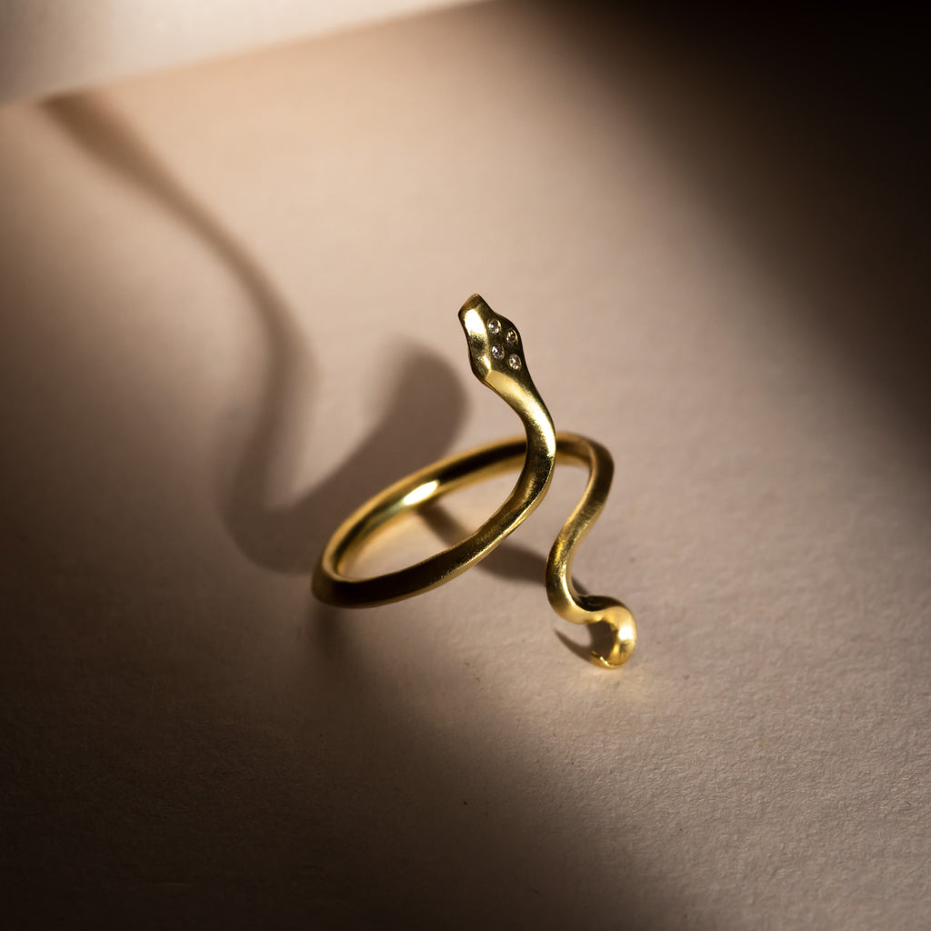 Yellow gold and diamond snake ring