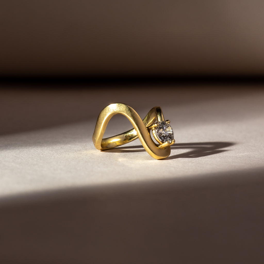 Yellow gold and diamond wave ring