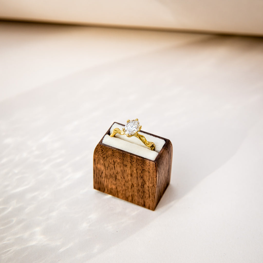 Unique oval Canadian diamond engagement ring in wooden box