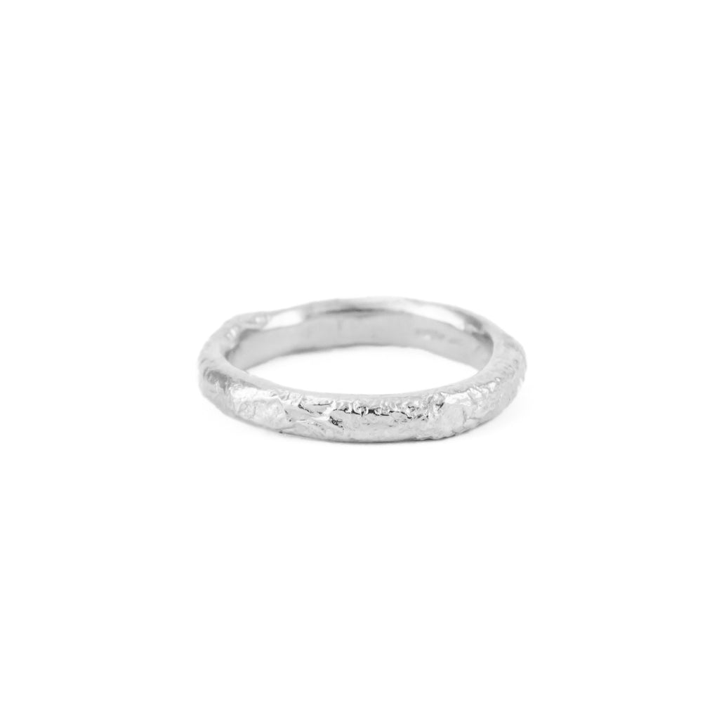 Recycled sterling silver textured wedding band ring