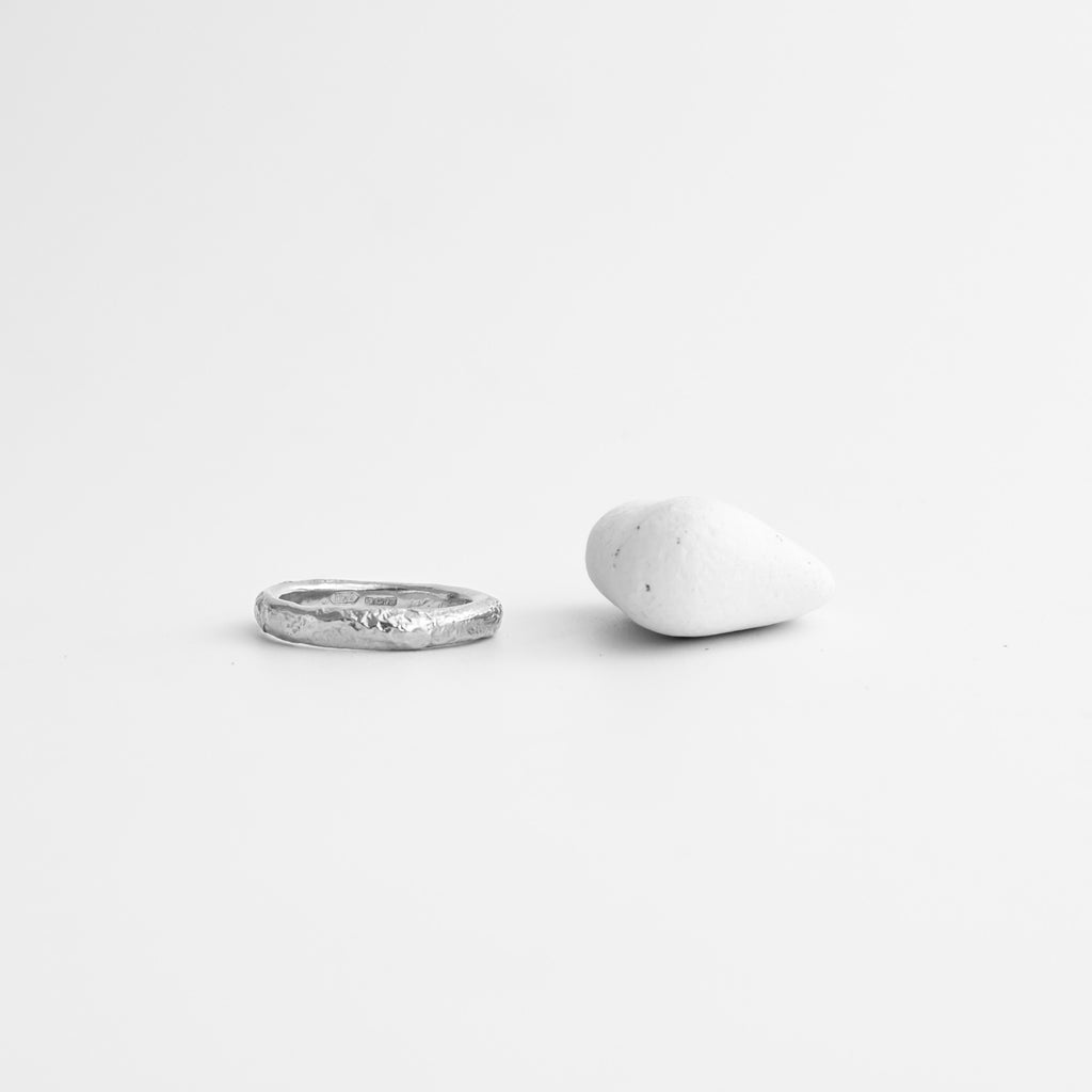 Recycled sterling silver textured wedding band ring